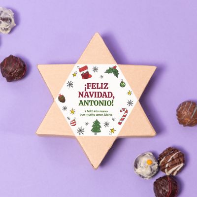 Caja de bombones de estrella en diseño navideño con texto